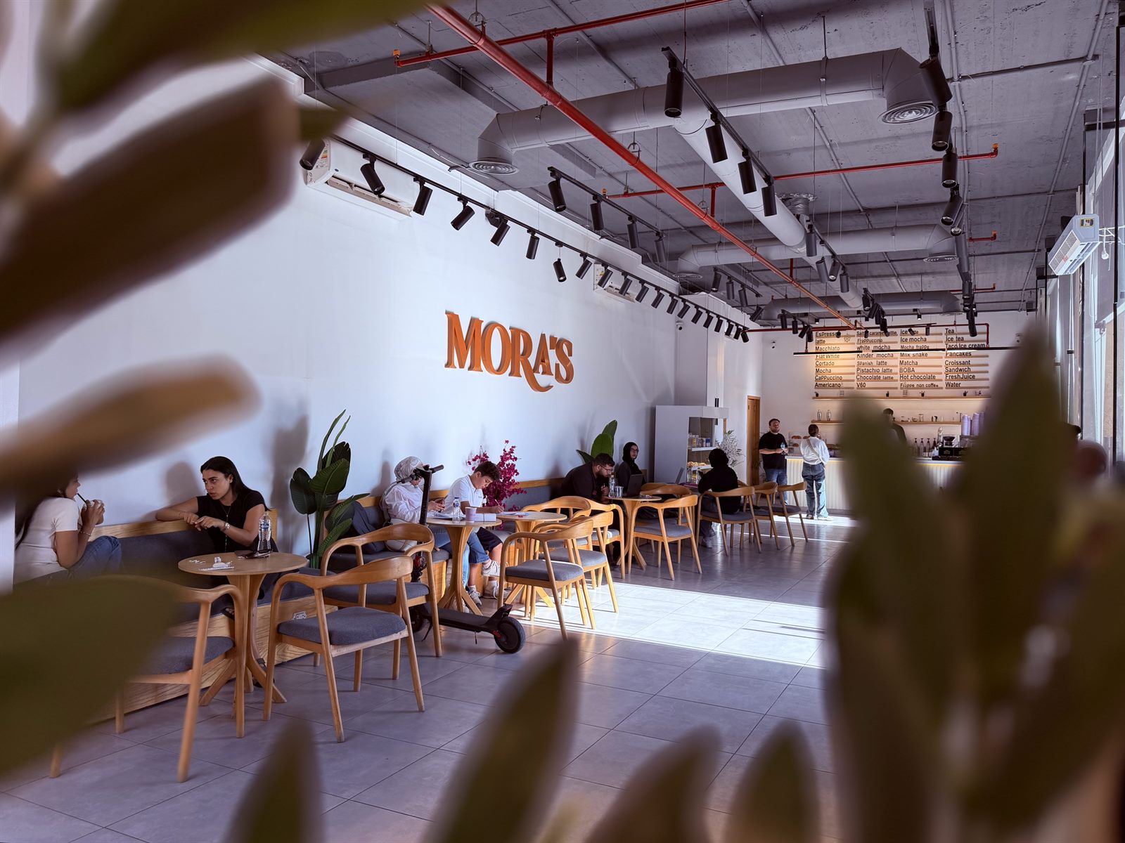Mora's interior with customers